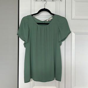Loft green flutter top with button back detail